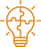 Orange lightbulb puzzle icon symbolizing creative logistics problem solving RGC Shipping